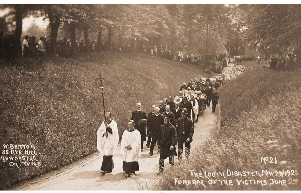 Procession in the distance at Louth Cemetery